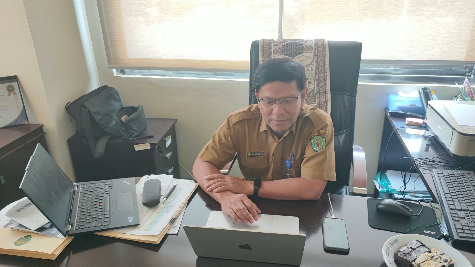 Kepala Bidang Perencanaan dan Penganggaran Sistem Informasi Pendapatan Bapenda Kaltim, Purwanto