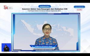 Sektor Keuangan Indonesia - Gedung Otoritas Jasa Keuangan (OJK) di Jakarta yang terus memantau stabilitas sistem keuangan nasional di tengah risiko geopolitik dunia.