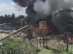 serangan udara Myanmar - Asap membumbung tinggi akibat serangan udara militer Myanmar yang menyasar pemukiman warga sipil di wilayah konflik.